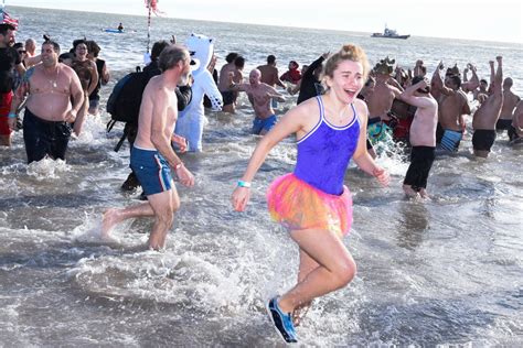 Polar bear swim coney island - Coney Island Plungers rejoice! After having to take a year off from its traditional event due to the COVID-19 pandemic, the Annual Coney Island Polar Bear Club New Year’s Day Plunge is returning ...